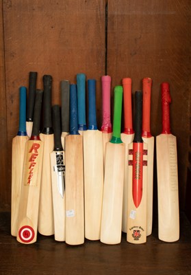 Lot 40 - A collection of miniature cricket bats