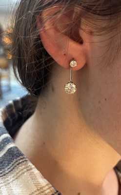 Lot 2 - A pair of diamond drop earrings