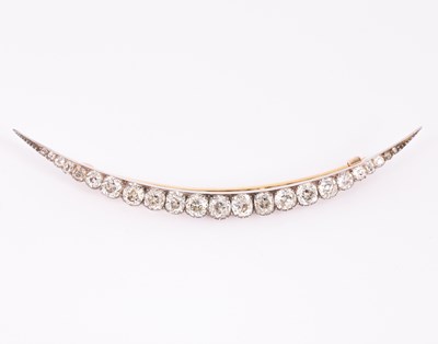 Lot 4 - A Victorian diamond set crescent brooch