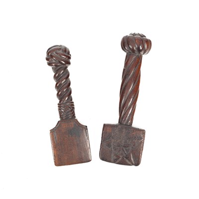 Lot 866 - Two treen sailmakers' seam rubbers