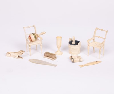 Lot 651 - A small group of miniature dolls' house bone items