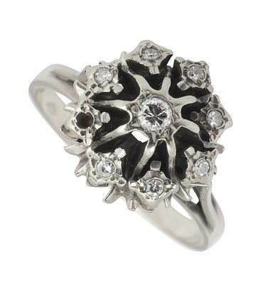 Lot 660 - An 18ct white gold and diamond dress ring