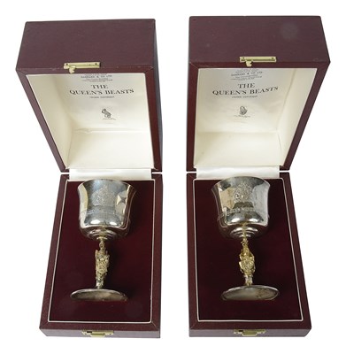 Lot 577 - A pair of silver and silver-gilt Queen's Beasts goblets