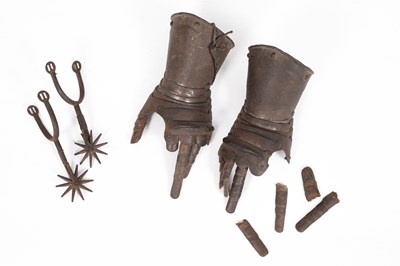 Lot 908 - A pair of 19th Century riveted steel gauntlets