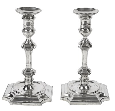 Lot 561 - A pair of 18th Century style silver candlesticks