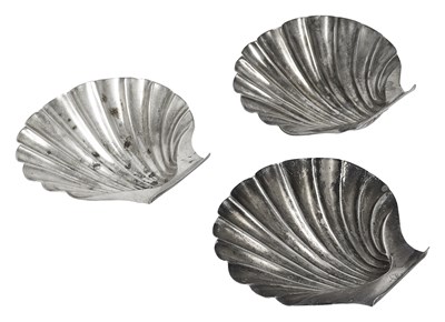 Lot 600 - A set of three George III silver butter shells