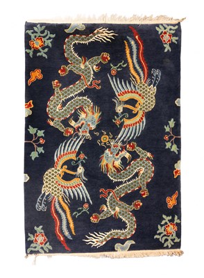 Lot 834 - A Tibetan dragon rug