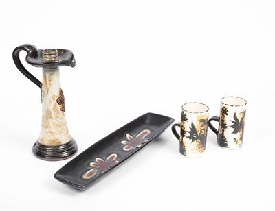 Lot 89 - A German pottery candle holder