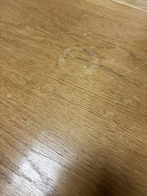 Lot 11 - An Arts & Crafts style oak dropleaf table