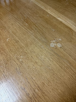 Lot 11 - An Arts & Crafts style oak dropleaf table