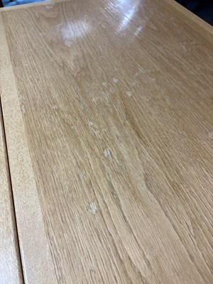 Lot 11 - An Arts & Crafts style oak dropleaf table