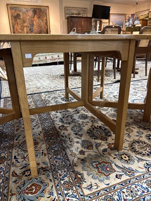 Lot 11 - An Arts & Crafts style oak dropleaf table