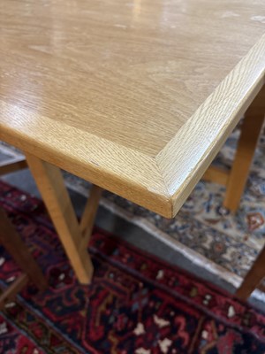 Lot 11 - An Arts & Crafts style oak dropleaf table