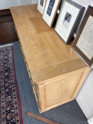 Lot 22 - A large pine chest of drawers