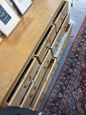 Lot 22 - A large pine chest of drawers