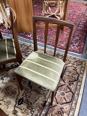 Lot 46 - A teak rectangular extending dining table and a set of four matching chairs