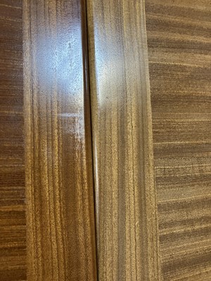 Lot 46 - A teak rectangular extending dining table and a set of four matching chairs