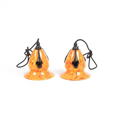 Lot 117 - A pair of orange and black splatter glass pendant lights