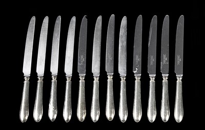 Lot 587 - A set of twelve silver handled knives