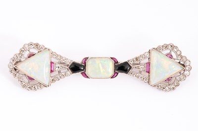 Lot 46 - An Art Deco opal and diamond bar brooch