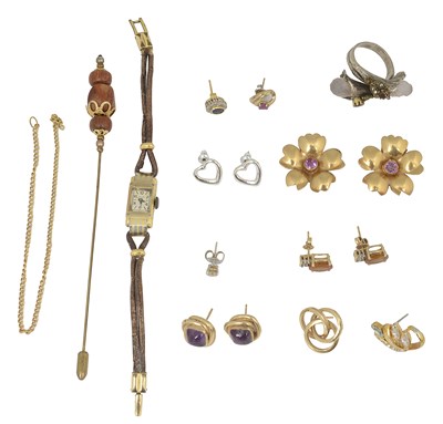 Lot 664 - A pair of amethyst cabochon ear studs