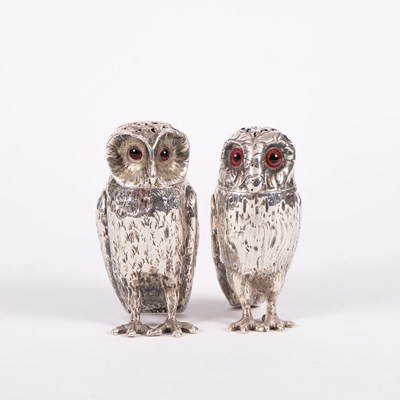 Lot 70 - Two Victorian novelty silver owl pepper pots
