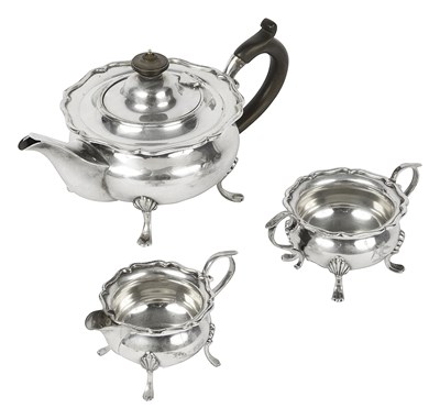 Lot 574 - A silver three-piece tea set