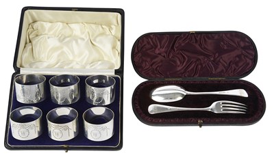 Lot 576 - A set of six silver napkin rings