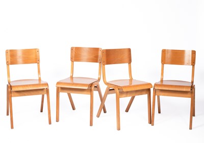 Lot 132 - A set of four mid Century plywood stacking chairs