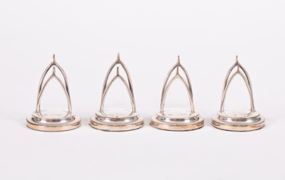 Lot 34 - A set of four novelty silver menu or place card holders