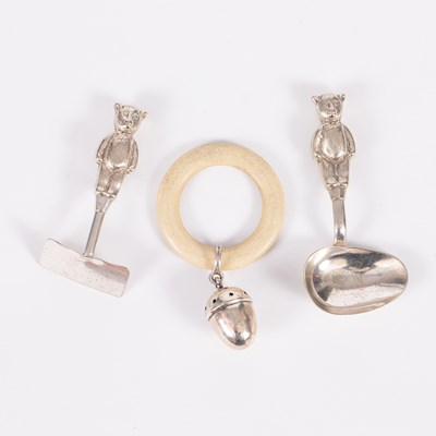 Lot 85 - A novelty EPNS spoon and pusher