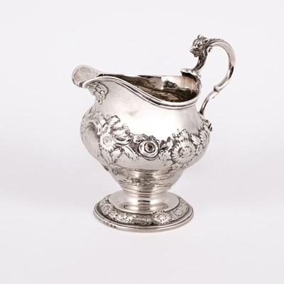 Lot 119 - A George IV silver cream jug