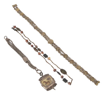 Lot 621 - A late Georgian hairwork watch fob with integral watch key