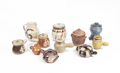 Lot 393 - Various studio pottery lidded pots, jug and jars