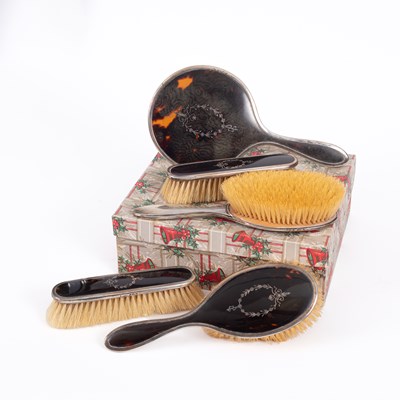 Lot 79 - A five-piece silver and tortoiseshell dressing table set