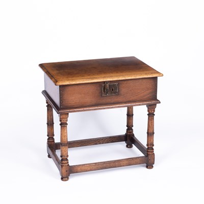 Lot 770 - A 17th Century style oak 'bible box' side table or box on stand