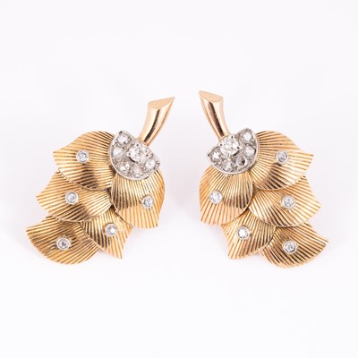 Lot 16 - A pair of gold and diamond ear studs