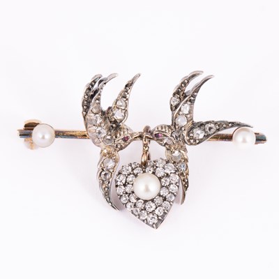 Lot 18 - An Edwardian diamond, pearl and ruby bar brooch