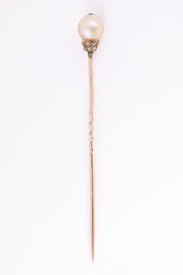 Lot 67 - A diamond and pearl stick pin