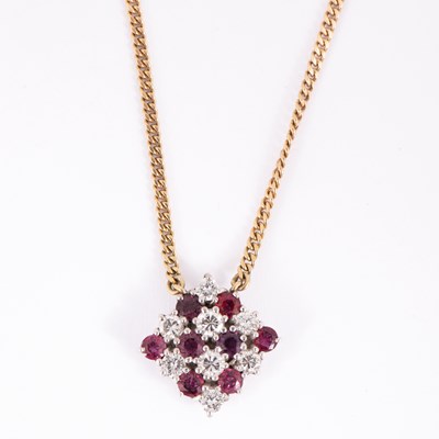 Lot 66 - A ruby and diamond pendant
