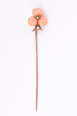 Lot 63 - A Victorian coral and pearl stick pin