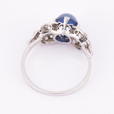 Lot 51 - An Art Deco star sapphire and diamond ring