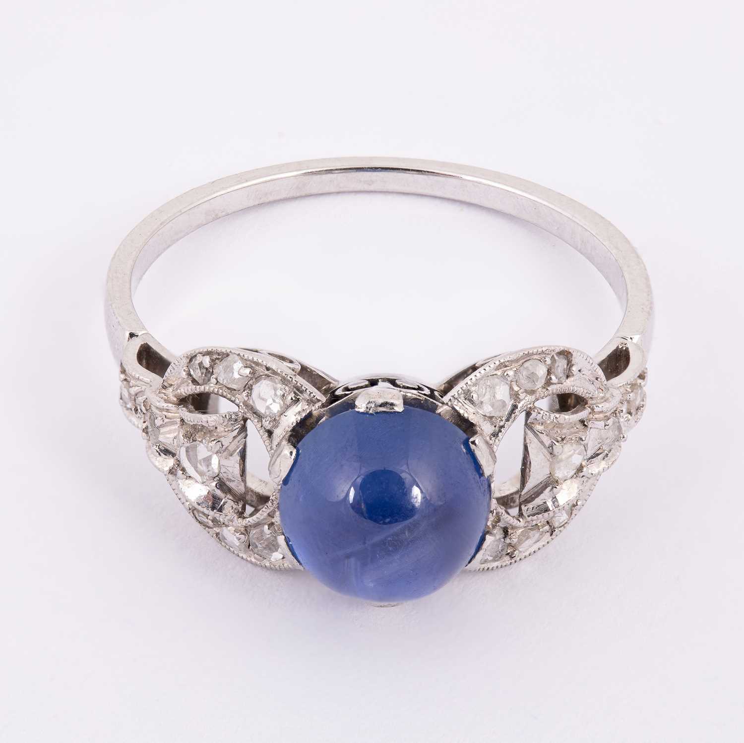 Lot 51 - An Art Deco star sapphire and diamond ring