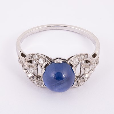 Lot 51 - An Art Deco star sapphire and diamond ring