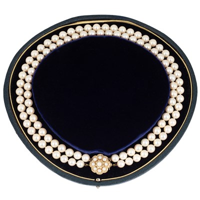 Lot An 18ct yellow gold and pearl two strand necklace