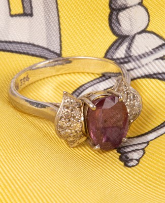 Lot 42 - An 18K white gold ruby and diamond ring