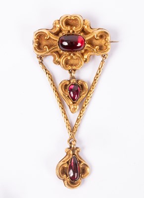 Lot 66 - A Victorian garnet and gold brooch