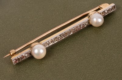 Lot 98 - A Victorian diamond and pearl bar brooch