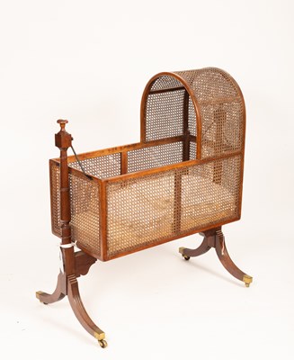 Lot 597 - A Regency mahogany framed cradle on stand
