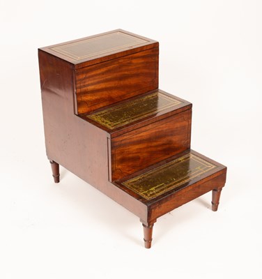 Lot 400 - A late George III mahogany bedside three step commode